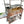 Angled view of the OctaGrills Santa Maria grill showing the octopus-logo brasero and stainless steel sear grate
