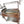 Three-quarter view of the OctaGrills Santa Maria stainless steel charcoal grill with hand wheel and side shelf
