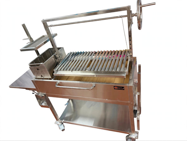 Three-quarter view of the OctaGrills Santa Maria stainless steel charcoal grill with hand wheel and side shelf
