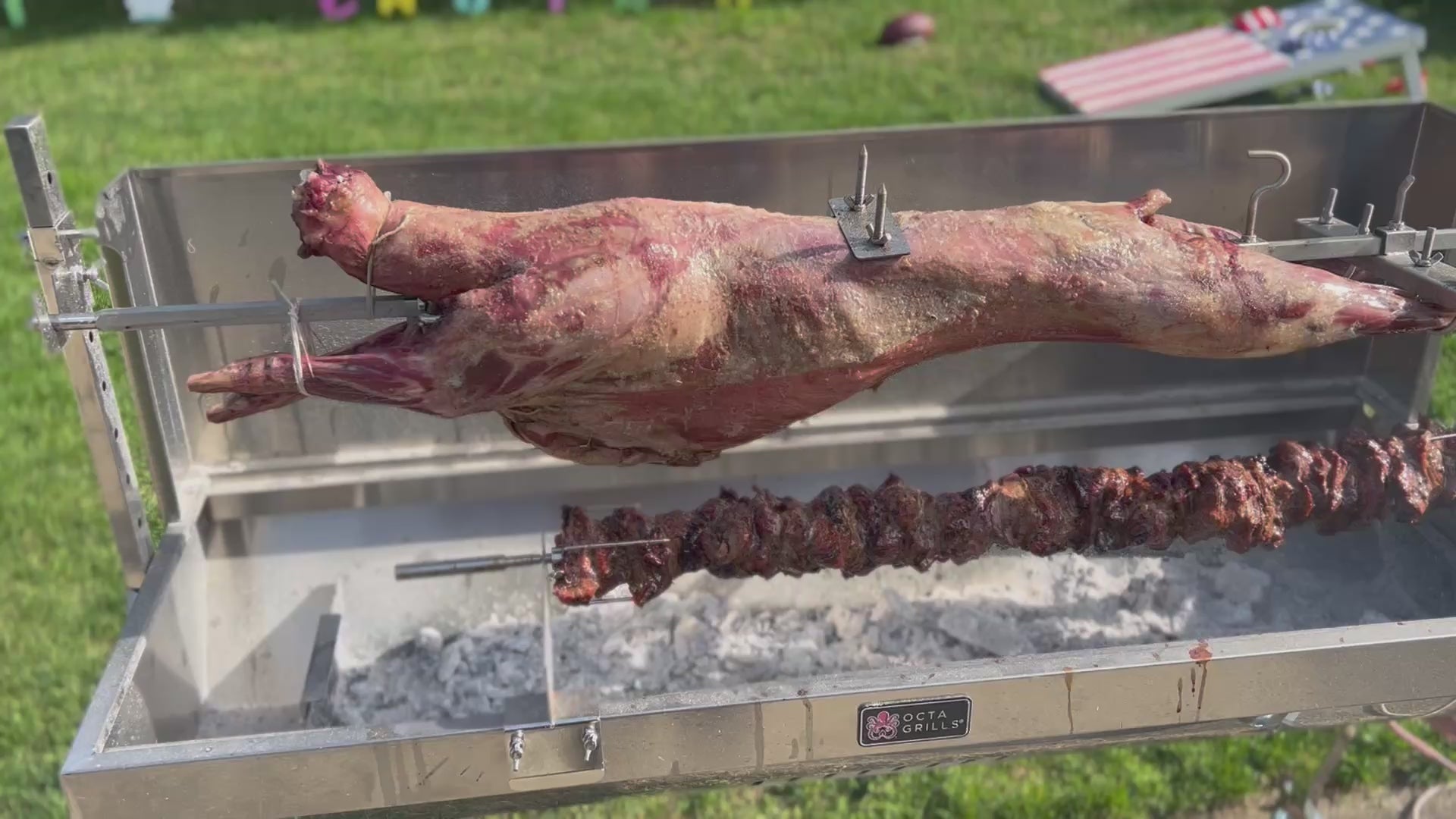 A video showing a whole lamb roasting on a spit in a backyard during Greek Easter, using the OctaGrills add-on skewer kit, with kokoretsi spinning on a smaller skewer.
